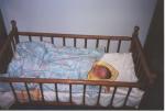 Ryan in Ma's old cradle (I think)